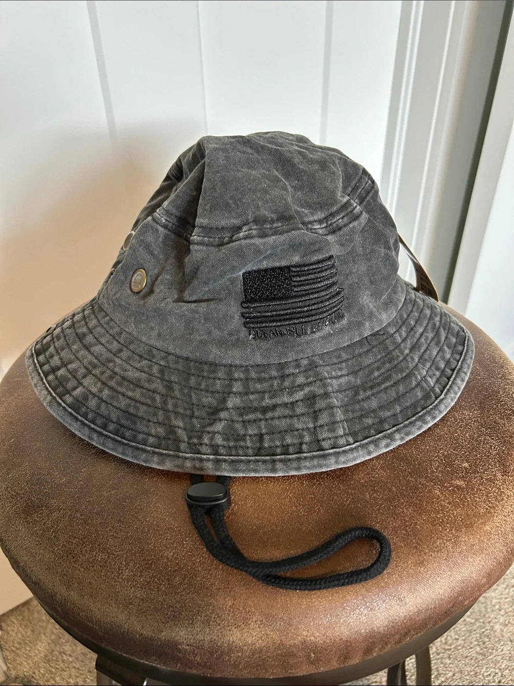 NWT Ocean Isle beach NC hat black chin tie breathing holes USA flag embroidered